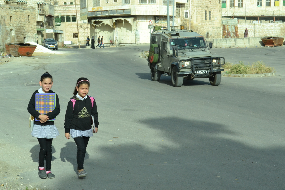Kids and soldiers in occupied Hebron (David Kattenburg)